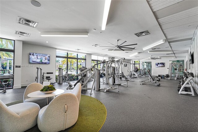 8301 NW 41st St Unit B-303, Doral, FL 33166 - gym with a ceiling fan and baseboards