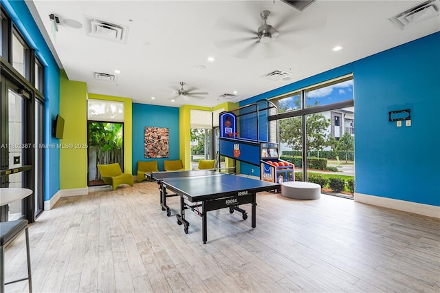 8301 NW 41st St Unit B-303, Doral, FL 33166 - playroom featuring ceiling fan, plenty of natural light, wood finished floors, baseboards, and recessed lighting