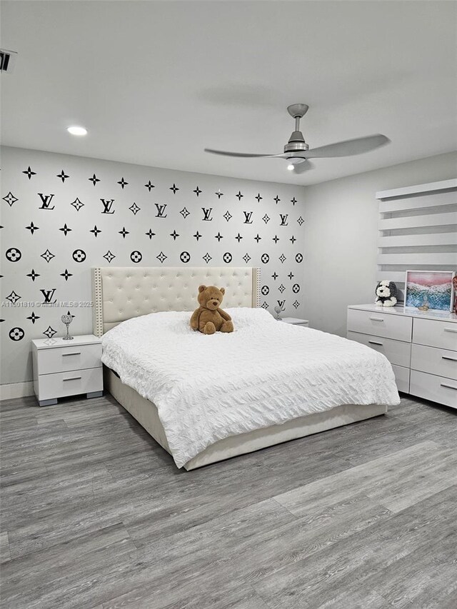 19110 NW 88th Ct, Hialeah, FL 33018 - bedroom with wallpapered walls, recessed lighting, baseboards, ceiling fan, and wood finished floors