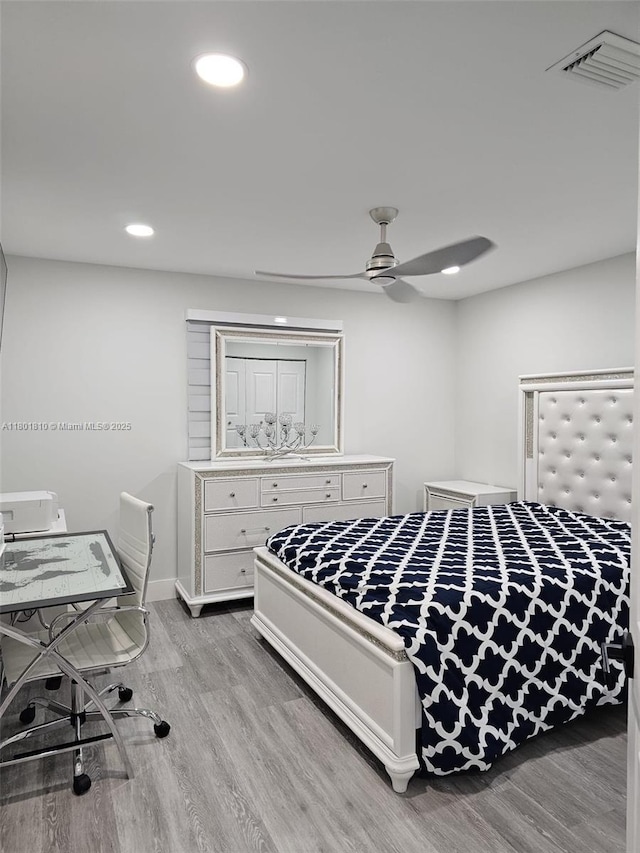 19110 NW 88th Ct, Hialeah, FL 33018 - bedroom featuring light wood-style floors, recessed lighting, and baseboards