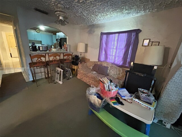10354 SW 173rd St, Miami, FL 33157 - living area with arched walkways and carpet floors