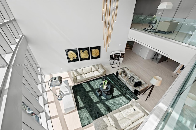 851 NE 1st Ave Ph 5401, Miami, FL 33132 - living area with stairs and a towering ceiling