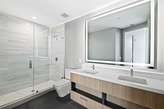 851 NE 1st Ave Ph 5401, Miami, FL 33132 - bathroom featuring toilet, tile patterned floors, a shower stall, and double vanity