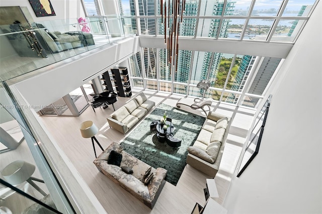 851 NE 1st Ave Ph 5401, Miami, FL 33132 - living area featuring a view of city, a water view, a high ceiling, and wood finished floors