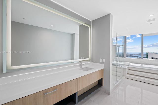 851 NE 1st Ave Ph 5401, Miami, FL 33132 - bathroom with a stall shower, vanity, and baseboards