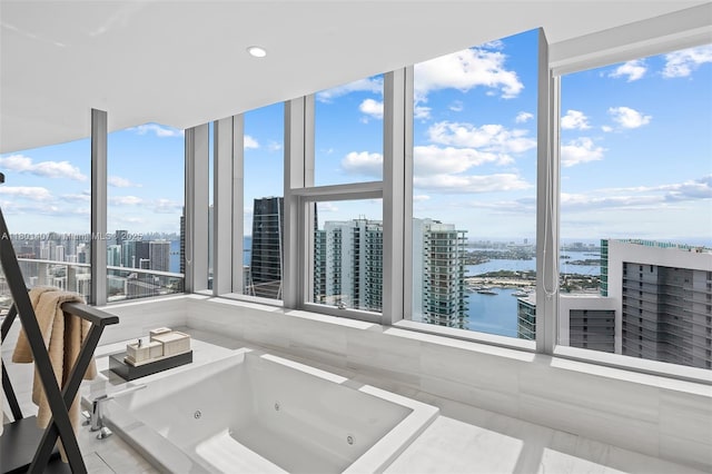 851 NE 1st Ave Ph 5401, Miami, FL 33132 - unfurnished sunroom featuring a water view, healthy amount of natural light, and a view of city