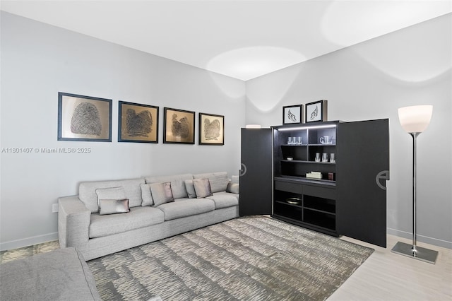 851 NE 1st Ave Ph 5401, Miami, FL 33132 - living area featuring baseboards and wood finished floors
