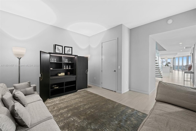 851 NE 1st Ave Ph 5401, Miami, FL 33132 - living room featuring wood finished floors and baseboards