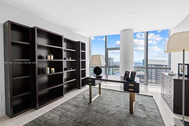 851 NE 1st Ave Ph 5401, Miami, FL 33132 - unfurnished office with expansive windows, a view of city, and light wood-style flooring