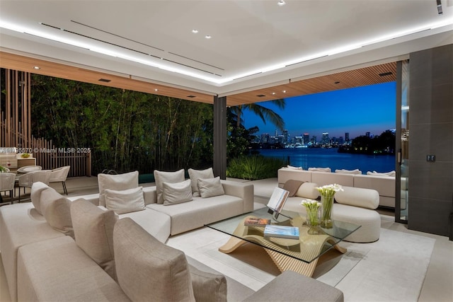 220 W Dilido Dr, Miami Beach, FL 33139 - view of patio / terrace with an outdoor living space, a water view, and a city view