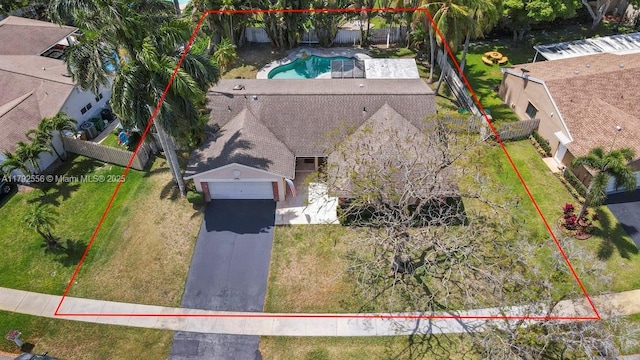 view from above of property with a pool area and property parcel outlined