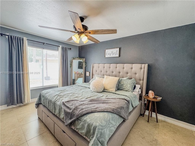 4002 Cascade Ln, La Belle, FL 33935 - bedroom with baseboards, a textured ceiling, ceiling fan, and tile patterned flooring