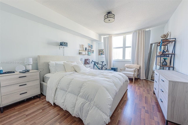 31 SE 5th St Unit 1603, Miami, FL 33131 - bedroom with wood finished floors and a textured ceiling