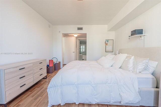 31 SE 5th St Unit 1603, Miami, FL 33131 - bedroom with wood finished floors