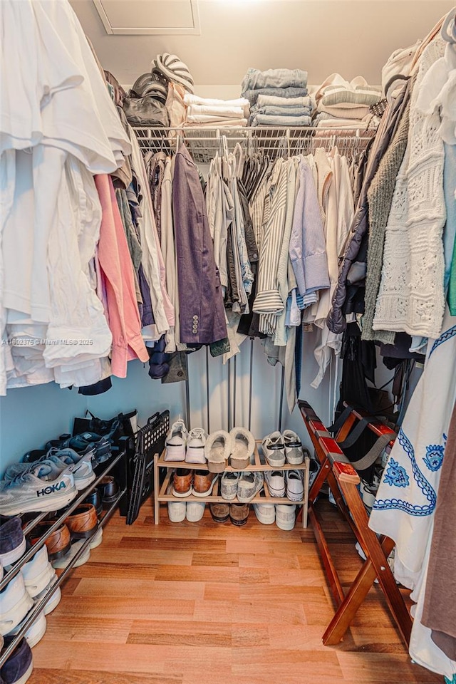 31 SE 5th St Unit 1603, Miami, FL 33131 - walk in closet featuring wood finished floors and attic access