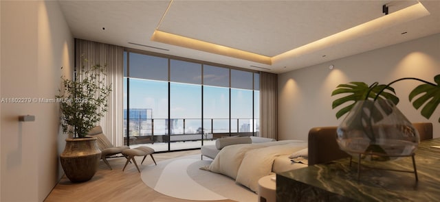 1000 Brickell Plz Unit Uph6201, Miami, FL 33131 - bedroom featuring floor to ceiling windows, wood finished floors, access to outside, and a raised ceiling