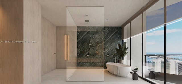 1000 Brickell Plz Unit Uph6201, Miami, FL 33131 - full bath featuring floor to ceiling windows, a freestanding bath, and a water view