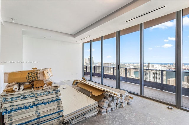 1000 Brickell Plz Unit Uph6201, Miami, FL 33131 - living area with a water view and plenty of natural light