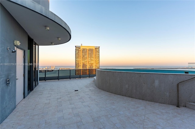 1000 Brickell Plz Unit Uph6201, Miami, FL 33131 - view of patio / terrace featuring a water view and a balcony