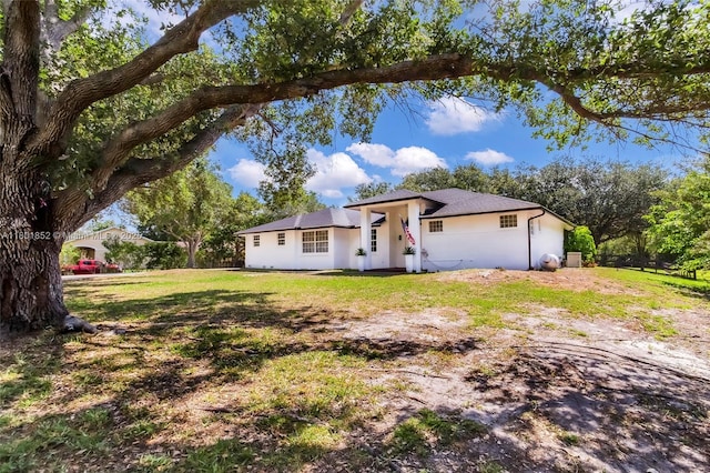 5530 SW 195th Ter, Southwest Ranches, FL 33332 - ranch-style home featuring stucco siding and a front lawn