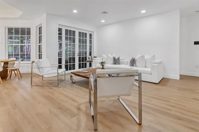 5530 SW 195th Ter, Southwest Ranches, FL 33332 - living room with french doors, wood finished floors, recessed lighting, and baseboards