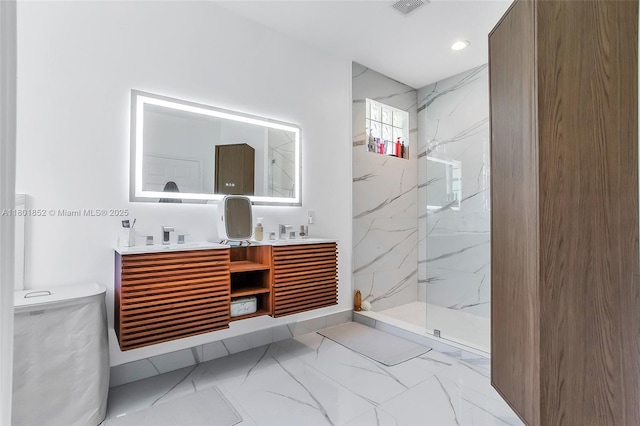 5530 SW 195th Ter, Southwest Ranches, FL 33332 - full bathroom with marble look tile flooring, a marble finish shower, double vanity, and recessed lighting