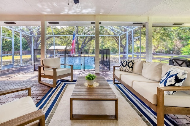 5530 SW 195th Ter, Southwest Ranches, FL 33332 - sunroom featuring an outdoor living space and plenty of natural light