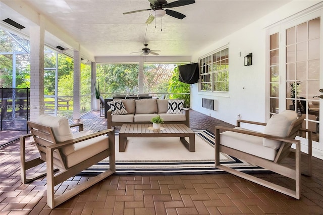 5530 SW 195th Ter, Southwest Ranches, FL 33332 - sunroom with outdoor lounge area, a ceiling fan, and healthy amount of natural light