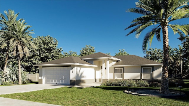 1108 Henry Ave, Lehigh Acres, FL 33972 - view of front of home with driveway, a front lawn, an attached garage, and stucco siding