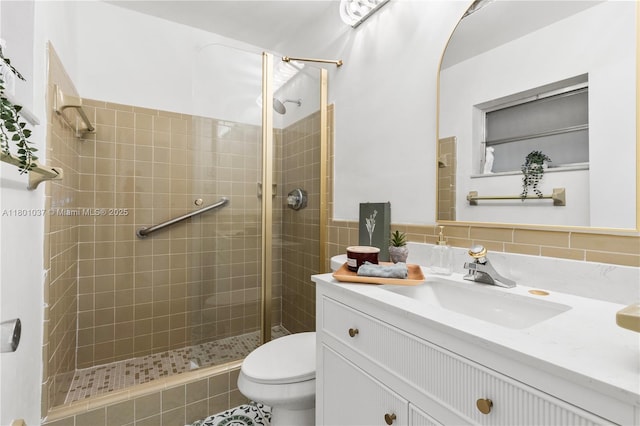 5706 NW 81st Ave, Tamarac, FL 33321 - bathroom with a stall shower, toilet, vanity, and tile walls