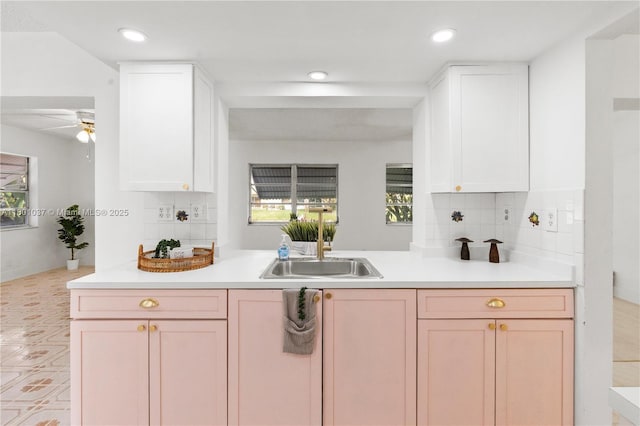 5706 NW 81st Ave, Tamarac, FL 33321 - kitchen featuring a sink, healthy amount of natural light, backsplash, and recessed lighting
