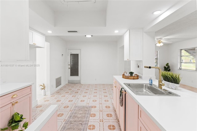 5706 NW 81st Ave, Tamarac, FL 33321 - kitchen featuring a sink, light countertops, recessed lighting, white cabinetry, and dishwasher