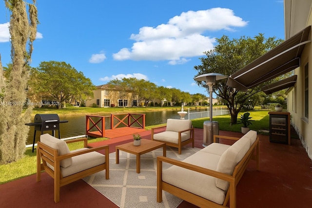 5706 NW 81st Ave, Tamarac, FL 33321 - view of patio / terrace featuring a water view, outdoor lounge area, and a grill