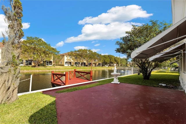 5706 NW 81st Ave, Tamarac, FL 33321 - view of home's community with a water view and a lawn