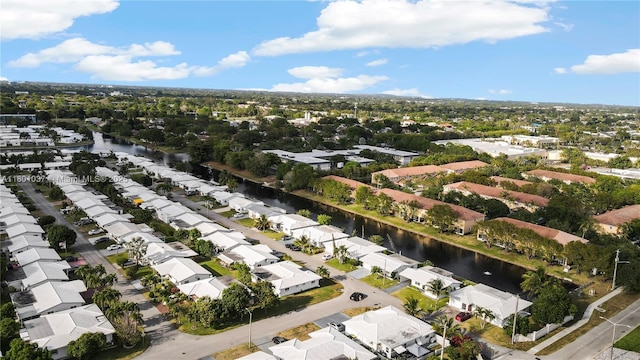 5706 NW 81st Ave, Tamarac, FL 33321 - aerial perspective of suburban area with a nearby body of water