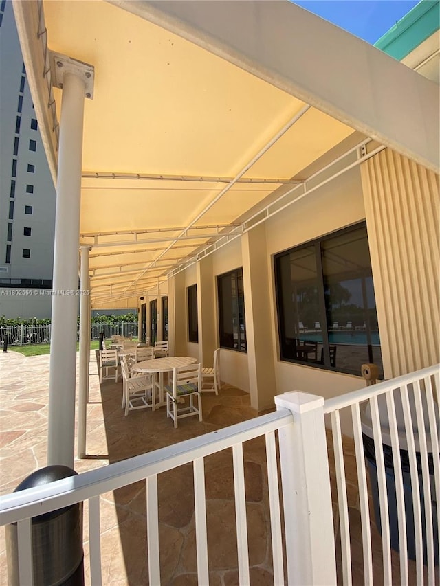 view of patio / terrace with fence and outdoor dining area
