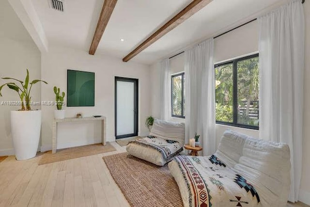 4228 NW 3rd Ave, Miami, FL 33127 - bedroom featuring beamed ceiling and light wood finished floors