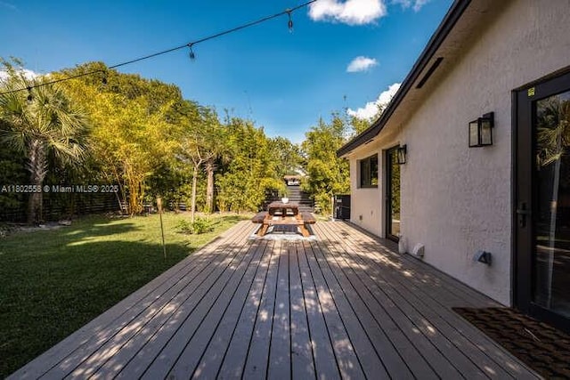 4228 NW 3rd Ave, Miami, FL 33127 - wooden deck featuring a yard
