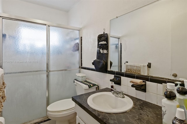 4216 NW 52nd Ave, Lauderdale Lakes, FL 33319 - bathroom with tasteful backsplash, vanity, a stall shower, and toilet