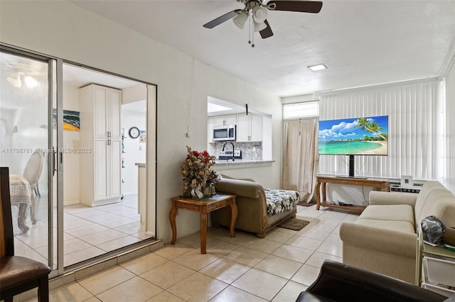 4216 NW 52nd Ave, Lauderdale Lakes, FL 33319 - living room with light tile patterned flooring and ceiling fan