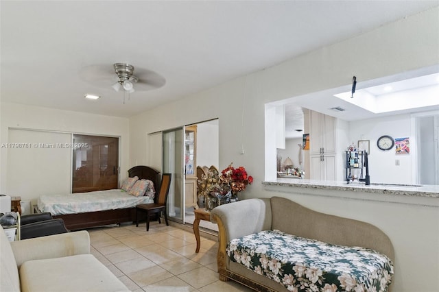 4216 NW 52nd Ave, Lauderdale Lakes, FL 33319 - bedroom featuring light tile patterned flooring, ceiling fan, and a closet
