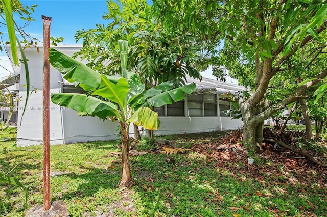 4216 NW 52nd Ave, Lauderdale Lakes, FL 33319 - view of yard with a sunroom