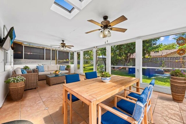 2426 NW 91st Ave, Coral Springs, FL 33065 - sunroom with ceiling fan, an outdoor living space, a skylight, and healthy amount of natural light