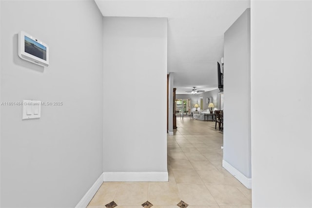 2426 NW 91st Ave, Coral Springs, FL 33065 - corridor with light tile patterned flooring and baseboards