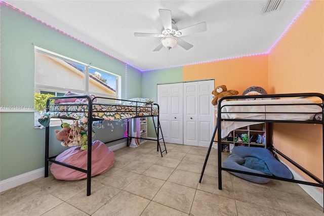 2426 NW 91st Ave, Coral Springs, FL 33065 - bedroom featuring a closet, tile patterned floors, baseboards, and a ceiling fan