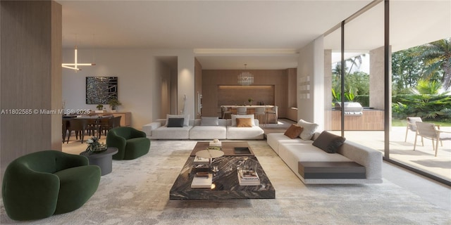 carpeted living area featuring a chandelier