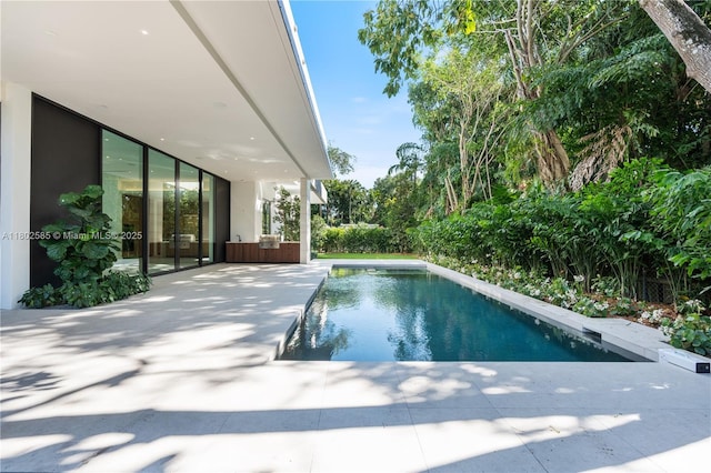 swimming pool with a patio