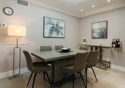 581 Blue Heron Dr Unit 318-B, Hallandale Beach, FL 33009 - dining area featuring baseboards, recessed lighting, and ornamental molding