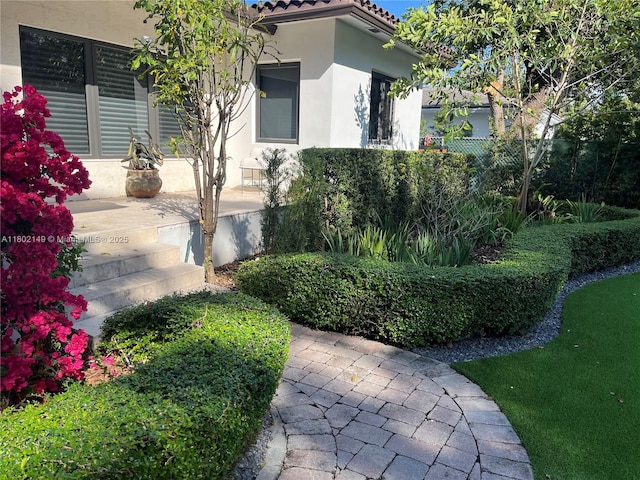 465 NE 52nd St, Miami, FL 33137 - view of side of property with stucco siding and a tile roof