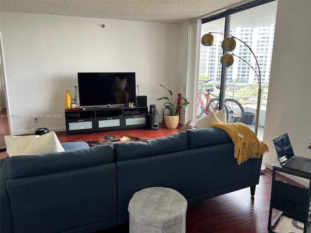 3300 NE 192nd St Unit 803, Aventura, FL 33180 - living room featuring wood finished floors, floor to ceiling windows, and a textured ceiling